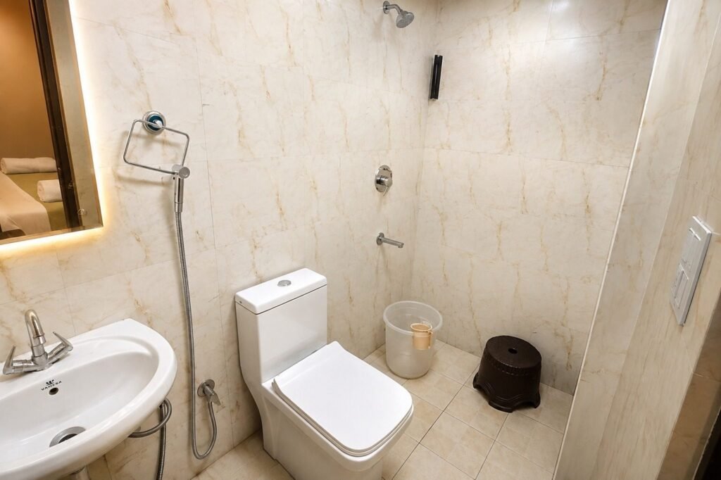 Clean white bathroom at Gange Hills by Around Stays