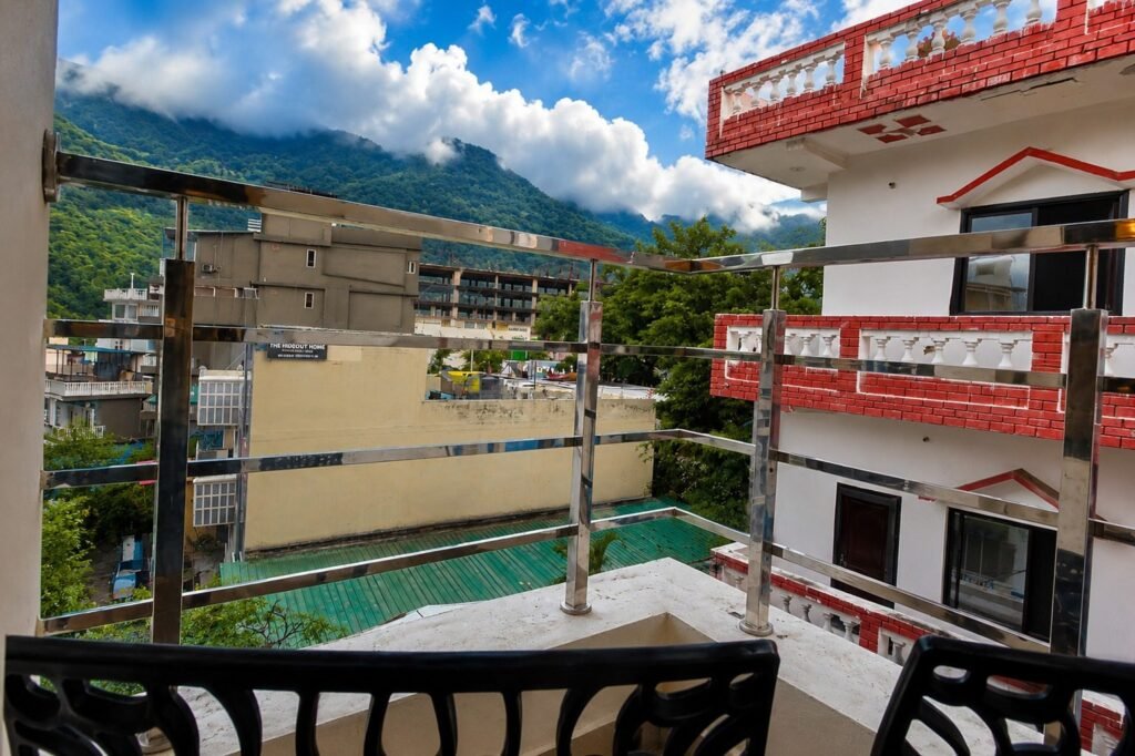 Hill view from the balcony at Gange Hills by Around Stays
