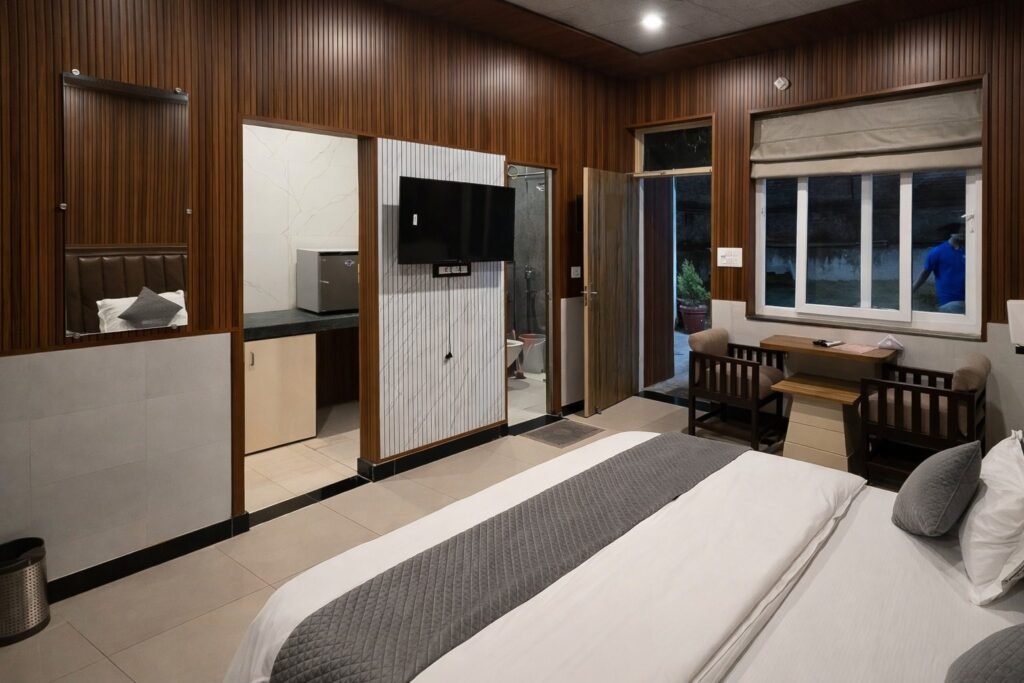 Studio room with kitchenette and dining nook at Rishikesh Heritage Resort by Around Stays