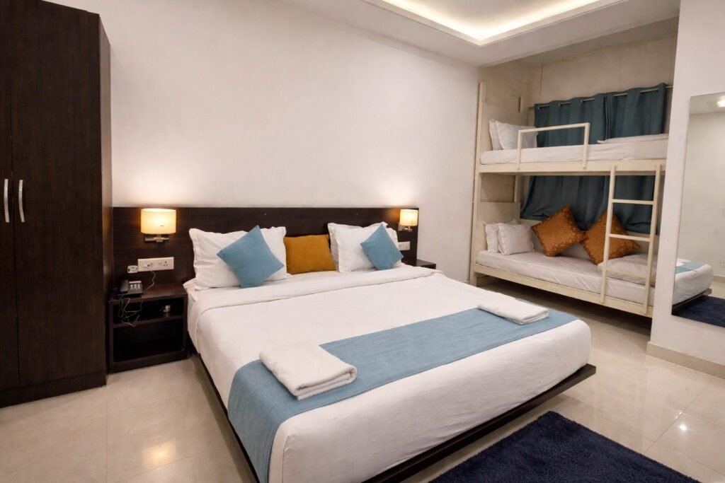 Room with a double bed and a bunk bed at Rising Hills by Around Stays
