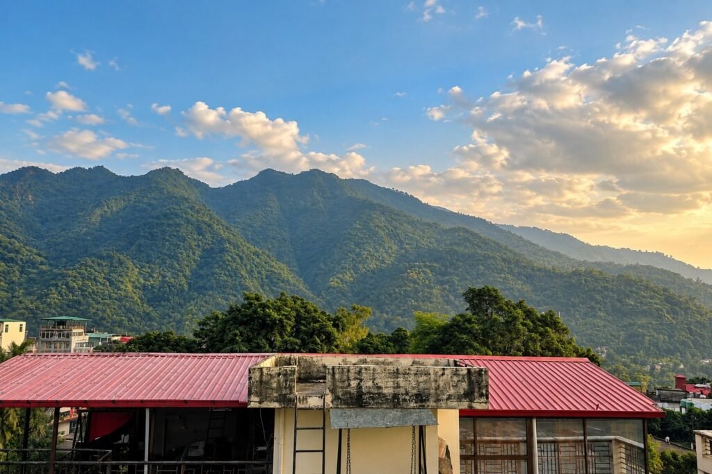 Green mountain range view at Tapovan Retreat by Around Stays