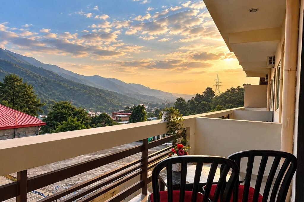 Balcony seating with valley view at sunset at Tapovan Retreat by Around Stays